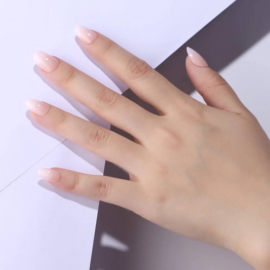 Oval-shaped neutral-toned press-on nails with creamy nude color palette, long-lasting UV-coated manicure kit with glue and tools_NextGen Glam