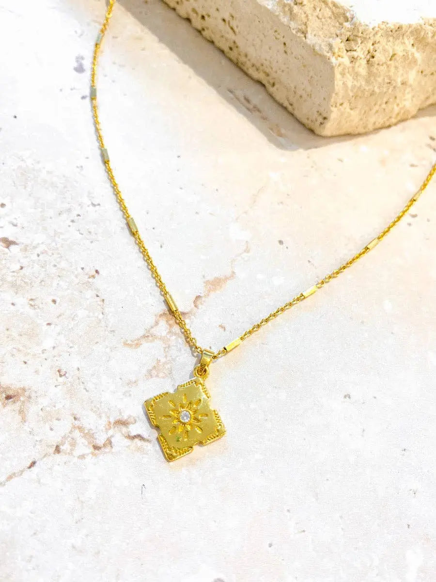 Lori Gold Plated Charm Necklace.
