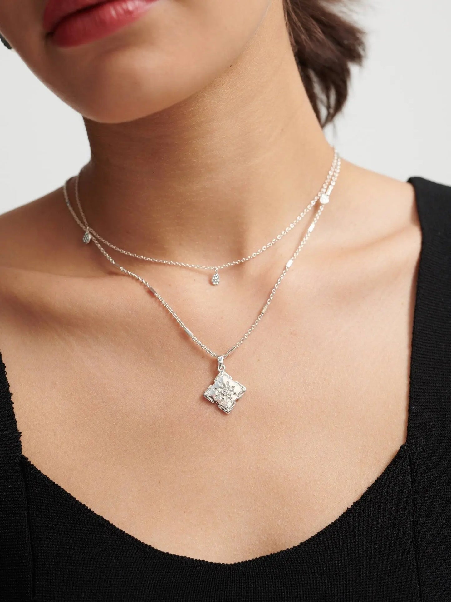 Lori Silver Sterling Plated Charm Necklace.