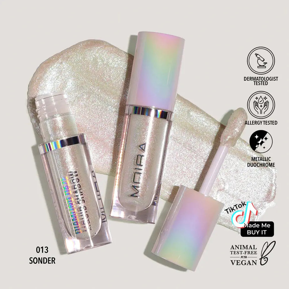 MOIRA Diamond Daze Liquid Shadow featuring a multi-chrome, glitter finish in a sleek tube with built-in applicator. The vegan, cruelty-free liquid eyeshadow delivers long-lasting, crease-proof color with no fallout. Perfect for creating bold, radiant eye looks, this clean beauty eye makeup glides on smoothly and offers high-impact shimmer for day or night wear_NextGen  Glam