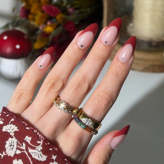 Almond-shaped press-on nails with deep wine-red French tips, nude base, and rhinestone accent, elegant long-lasting manicure kit with glue and tools-NextGen Glam