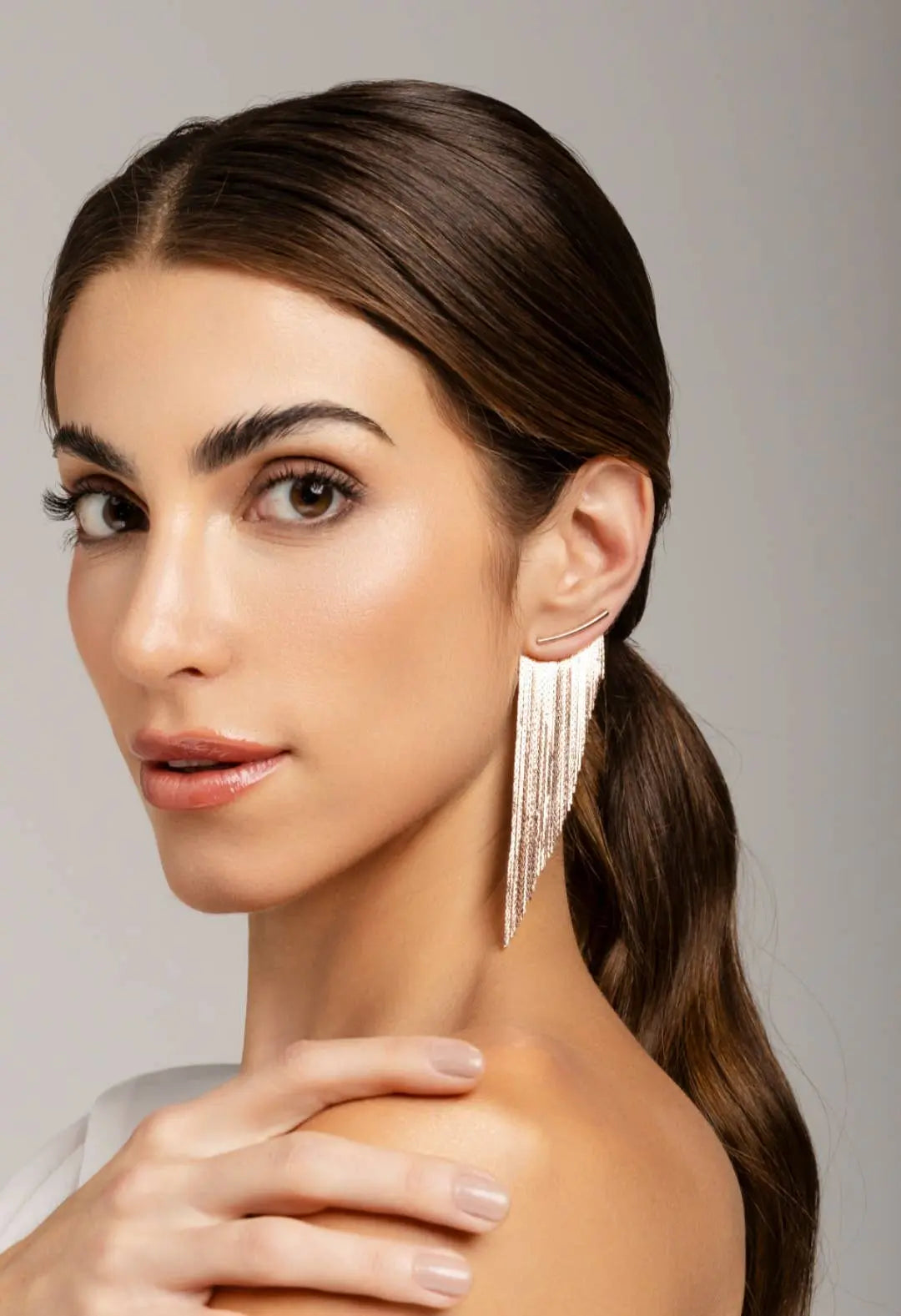 Rose gold statement earring with a diagonal cut design, glossy finish, and long silhouette; hypoallergenic and nickel-free, designed in Australia and ethically made-NextGen Gam